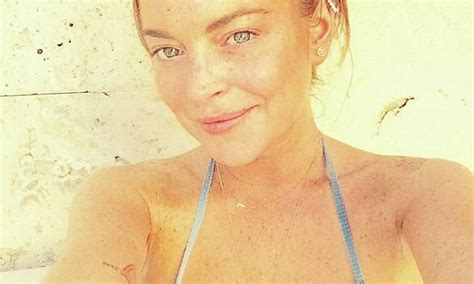 Lindsay Lohan Shows Off Her Cleavage In Busty Bikini Selfie Daily