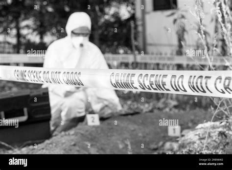 Crime scene investigation. Forensic science specialist working on human