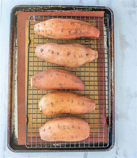 Bake, uncovered, directly on the oven racks (no baking pan needed) for 1 hour. How to Bake a Sweet Potato — Bless this Mess