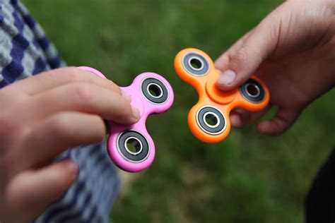 fidget spinners have no proven attention benefits new review says live science