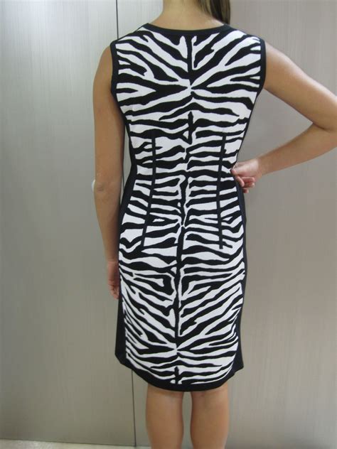 back of black and white zebra print dress