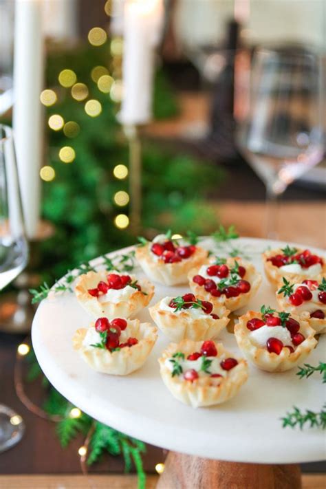 Here are 50 easy christmas appetizer recipes, from festive olive christmas trees and baked brie appetizers, to cheese boards, caprese wreaths and dips. Easy Holiday Appetizer - Baked Goat Cheese Bites - Modern Glam