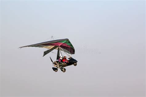 Ultralight Airplane Flying In A Blue Sky Stock Photo Image Of Flight