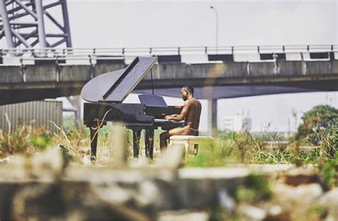 Singer Brymo Shares A Photo Of Himself Playing The Piano Naked