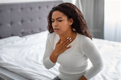 Young Black Woman Coughing Suffering From Sore Throat Stock Photo By