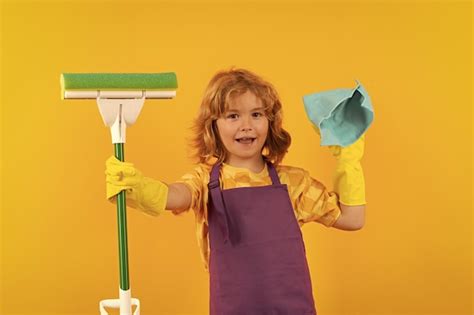 Premium Photo Child Doing Housework Studio Portrait Of Child Use