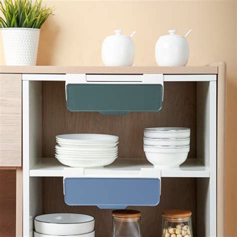 All of this is settles on a magnetic base so you can easily move the items around. Kitchen Cabinet Divider Shelf Drawer Organizer Utensil ...