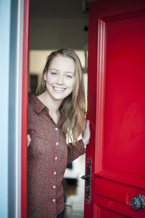Smiling Girl Opening The Door Stock Photo Free Download