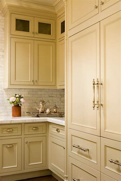 Use them to store pots and pans and. White Upper Kitchen Cabinets with Taupe Lower Kitchen ...