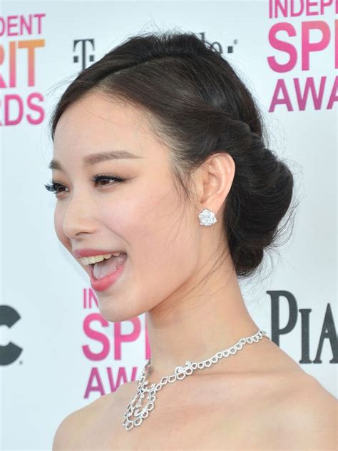 Ziyi Zhang Opted For A Classic Look With A Low French Twist At The