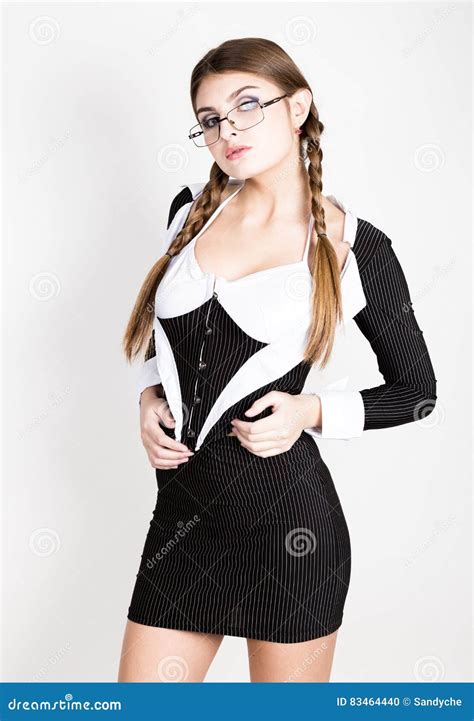 Secretary Portrait Of Beautiful Brunette Business Lady With Glasses And Wearing In Pinstripe