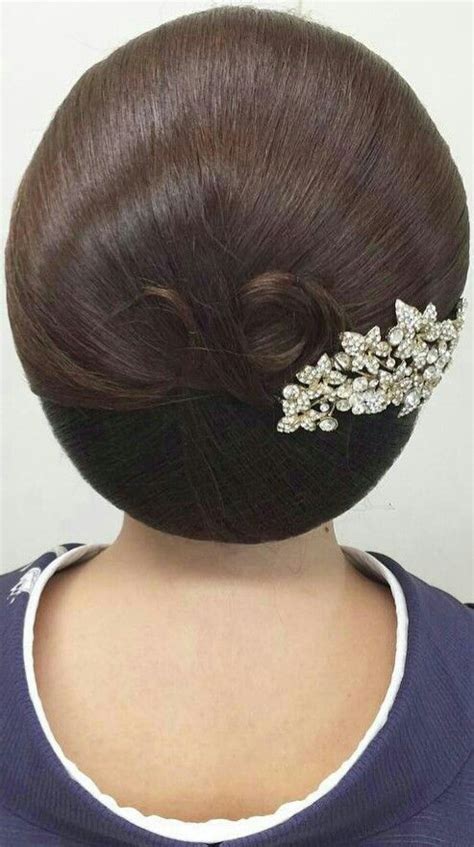 Putting all this hair up in a bun creates a big bun, which looks amazing! Pin by geetha on low bun | Big bun hair, Japan hairstyle ...