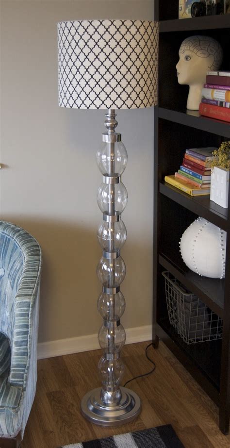 They also have a floor lamp that is similar in design. Glam on a Budget! DIY Stacked Glass Ball Bauble Lamp ...