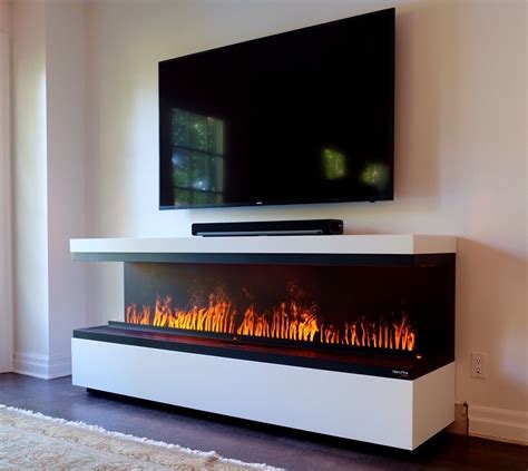 Here's a selection of the top rated, best 2. Fireplace with TV above. Water Vapor Technology Opti-Myst ...