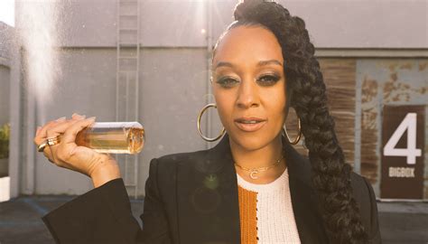 tia mowry on learning to love her curls and her skin care secrets