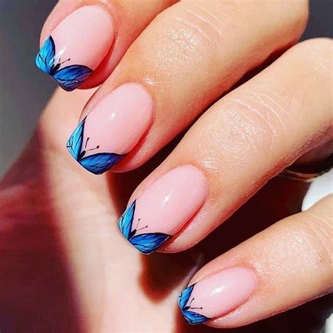 Add A Flutter Of Fun To Your Look With French Tip Nails And Butterflies