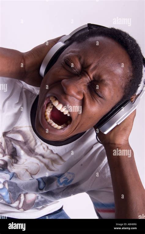 Black Man Screaming With Headphones Stock Photo 7368565 Alamy