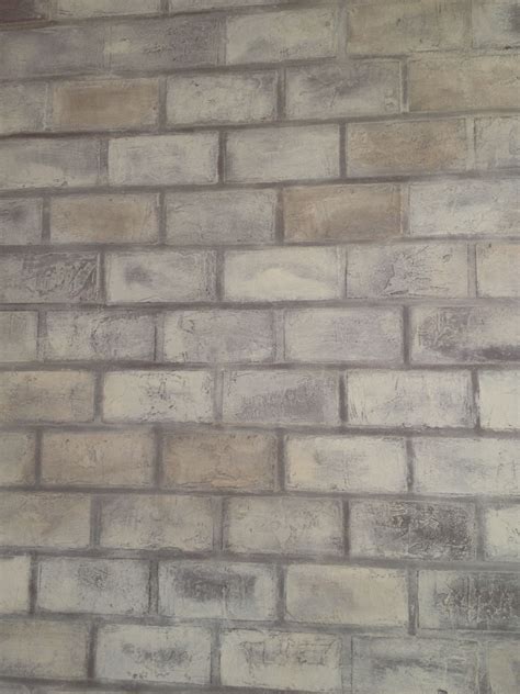 Custom Made Brick Wall Using Joint Compound And A Stencil And Then