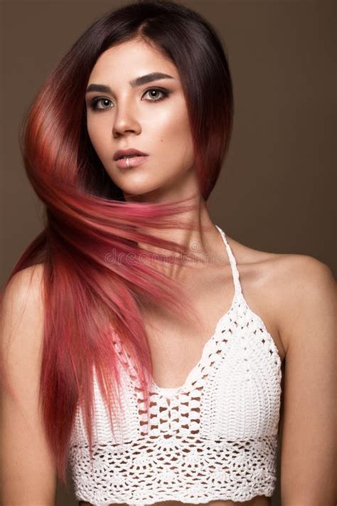 Beautiful Pink Haired Girl In Move With A Perfectly Smooth Hair And