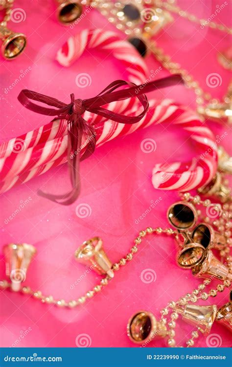 Red And White Christmas Candy Canes On Pink Stock Photo Image Of Pink