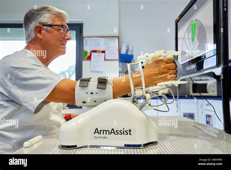 Patient With Assistive Robot For Upper Limb Rehabilitation The Robot