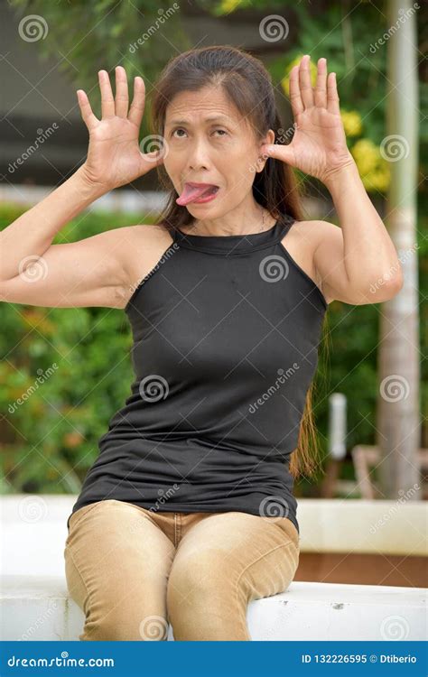 Filipina Adult Female Making Funny Faces Stock Image Image Of Asian Minorities