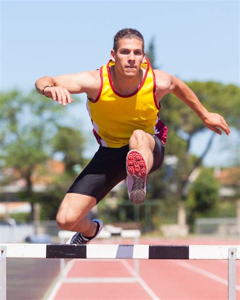 Male Track And Field Athlete During Obstacle Race Track And Field