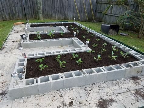 In most of his cinder block beds, he plants a variety of vegetables in the center and onions in the perimeter holes. 14 Cinderblock Garden Ideas For Your Veggies, Flowers and ...