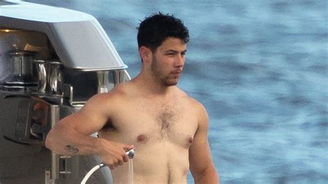this shirtless nick jonas pic has fans losing their minds read the best reactions