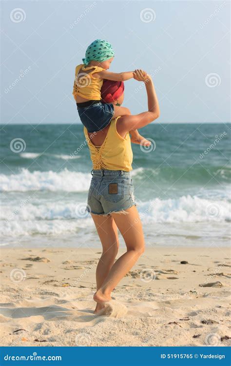 Young Mother Hugging Her Daughter On Beach Stock Image Image Of Kissing Active 51915765