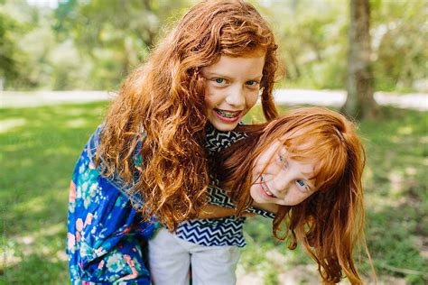 Two Young Red Headed Sisters Siblings By Stocksy Contributor