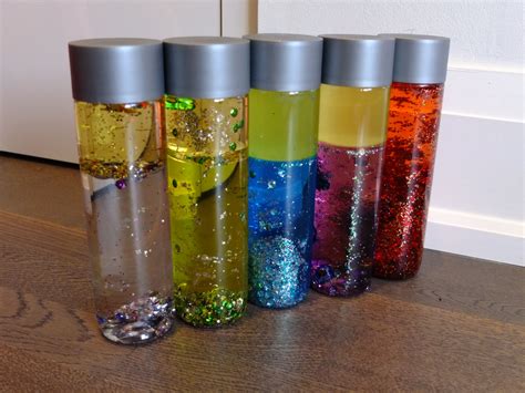 Diy Sensory Bottles Some Food Colouring In Water Sparkles And Finish