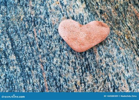 Heart Shaped Stone On Dark Background Red Stone Heart Stock Image