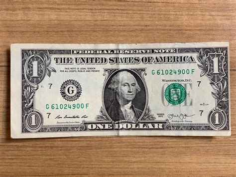 This misprinted one-dollar bill that I received in my change. : r