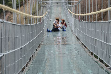 Zhangjiajie glass bridge built in hunan. China: Are you brave enough to cross this glass-bottomed ...