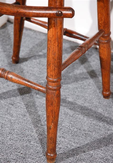 The very comfortable custom captain's bar stool swivels with arms from alfa bar stools offers a great variety of wood stains to match your decor. PAIR OF 19THC CAPTAINS CHAIR/SWIVEL BAR STOOLS at 1stDibs