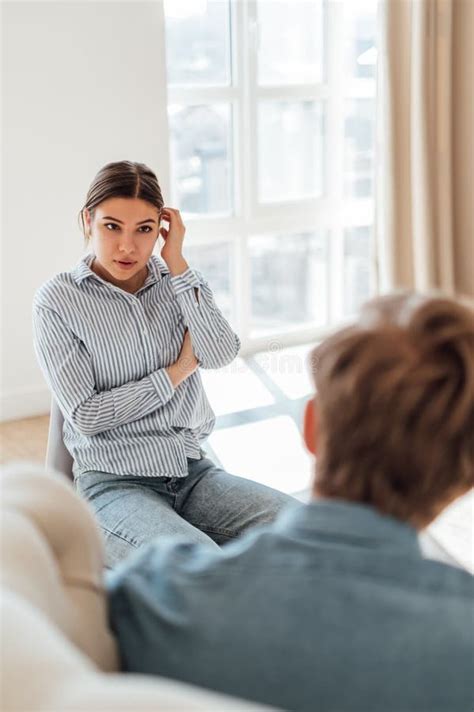 Upset Caucasian Woman Communicating With Her Psychologist At A