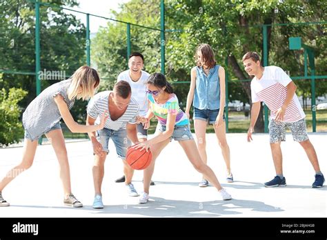 Teenagers Playing Basketball Stock Photo Alamy