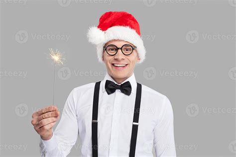 Happy New Year Cheerful Young Nerd Man In Bow Tie And Suspenders