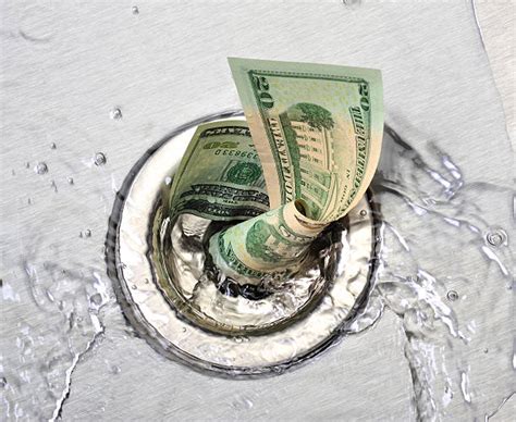 Money Down The Drain Pictures Images And Stock Photos Istock