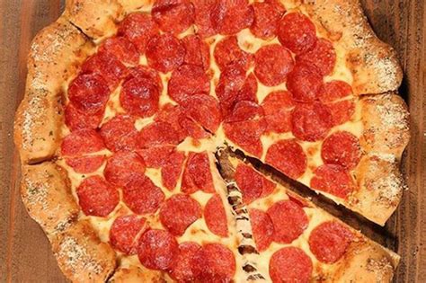 pizza hut unveils ingenious new stuffed crust filling for junk food fans and people think it s