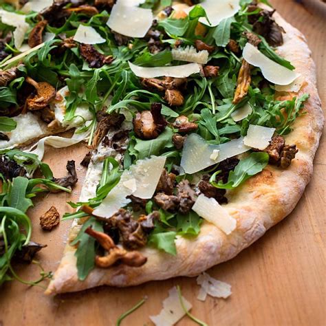 Wild Mushroom Pizza With Arugula And Pecorino Recipe Eatingwell