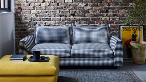 Deep And Low With Plump Pillowy Cushions The Theodore Medium Sofa Is