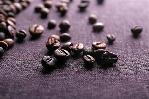 Premium Photo Roasted Coffee Grains Closeup