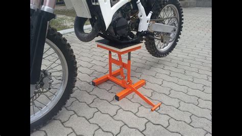 An improperly secured motorbike could roll or fall, causing expensive damage to the bike, and risk injury if it were to fall onto someone since many bikes are extremely. alzamoto fai da te (homemade dirt bike lift stand ) - YouTube