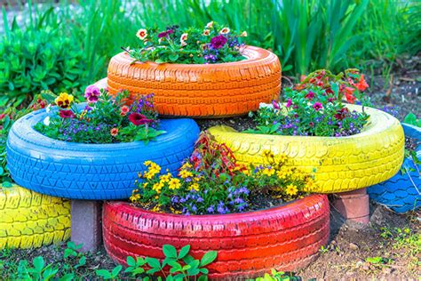 Transform Old Tire Into Diy Painted Tire Planter For Garden Diys And