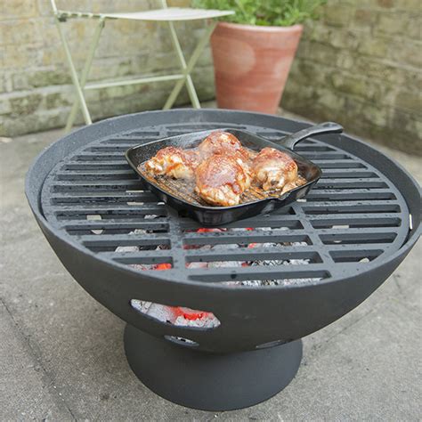 The fire pit with a grill top allows you to further the experience and enjoyment by adding a grill grate as part of the package so that you can grill your favorite food on your fire pit. Cast-iron Fire Pit With Grill Review - 9.9/10 rating