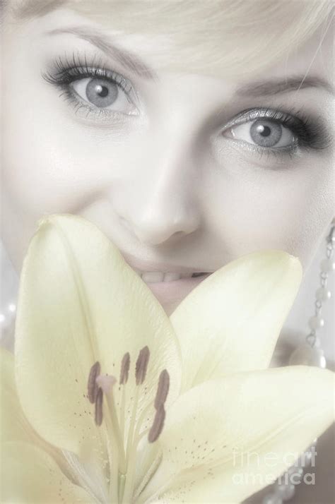 Beautiful Young Woman With A Yellow Lily Photograph By Oleksiy Maksymenko