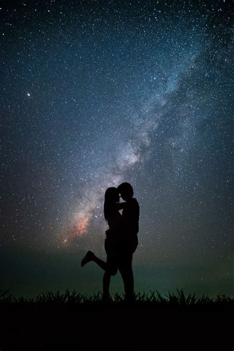 Couple Having Romantic Time At Night Background Is Milky