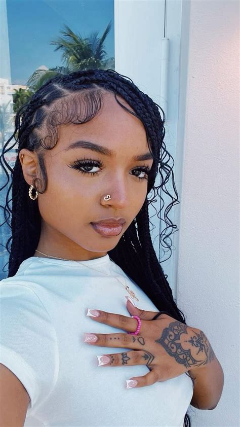 therealhippiee 🥀 in 2023 nose piercing goddess braids black women hairstyles